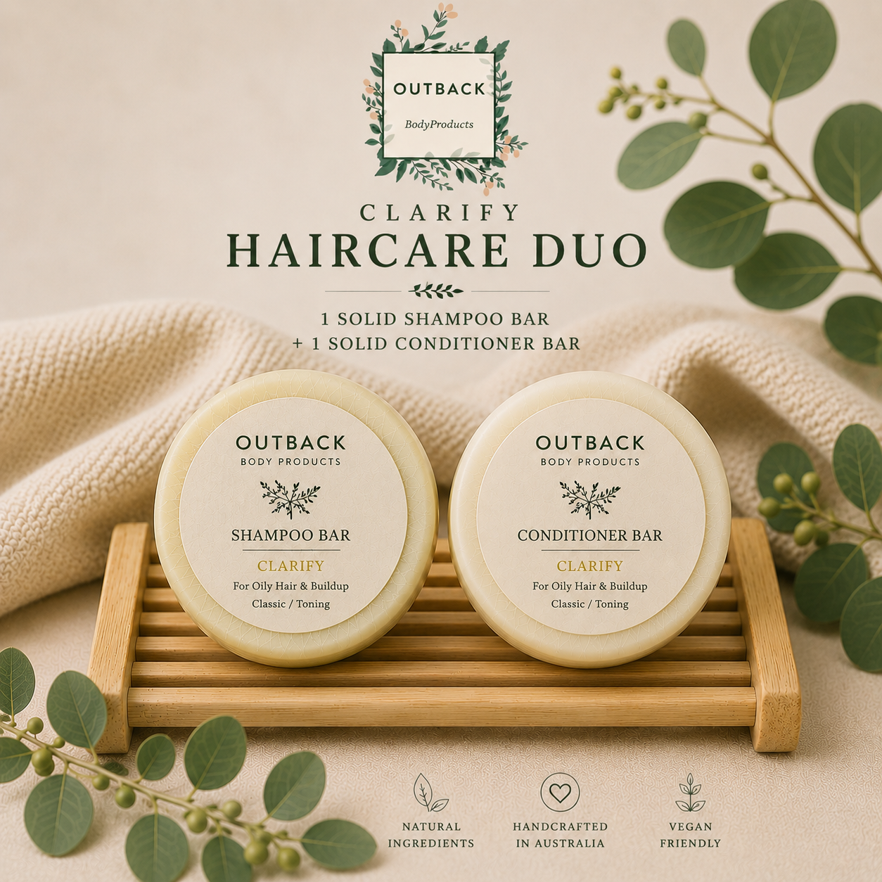 Outback Body Products Clarify Haircare Duo with shampoo and conditioner bars on a wooden stand.
