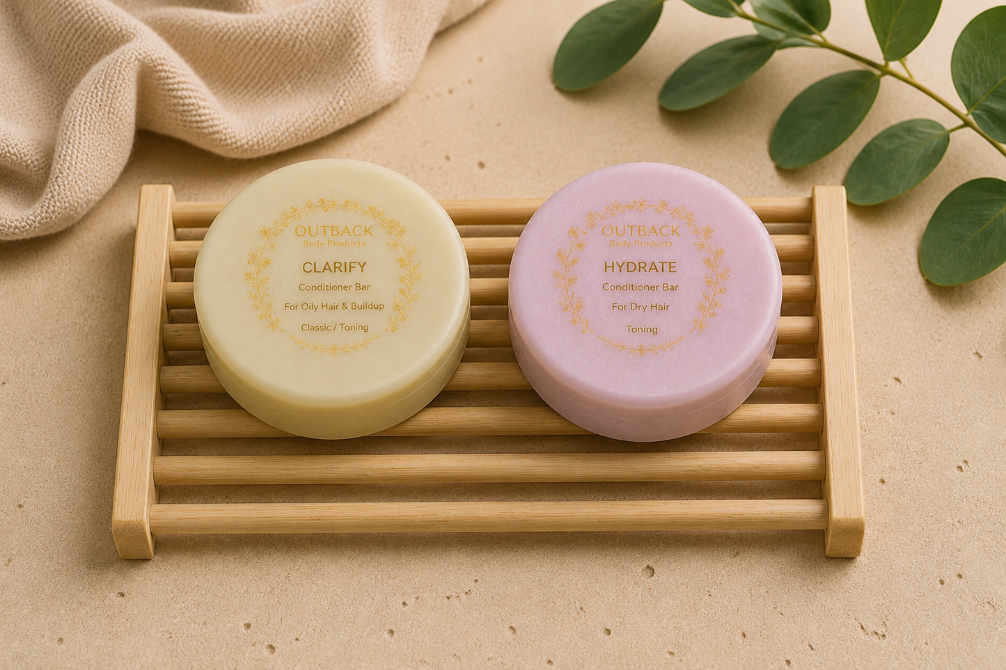 Two round containers labeled 'Clarify' and 'Hydrate' on a wooden tray with a beige background and green leaves.