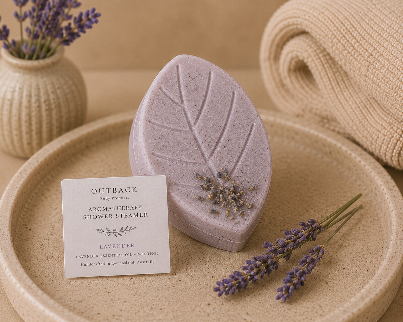 Leaf-shaped lavender shower steamer by outback body products